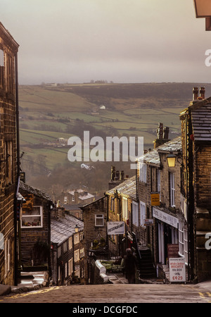 Looking down Main Street in the village of Haworth, where the Bronte family lived. West Yorkshire. UK Stock Photo