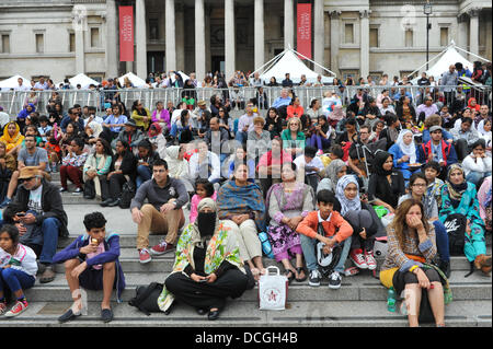 Trafalgar Square, London, UK. 17th August 2013. The crowd watch the stage in Trafalgar Square for the Eid Festival to celebrate the end of Ramadan. Credit:  Matthew Chattle/Alamy Live News