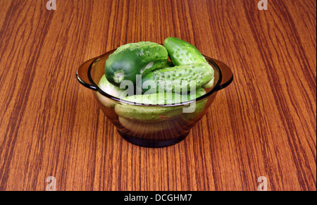 Young fresh cucumbers in a bowl for pickling vinegar Stock Photo