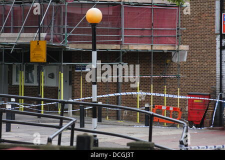 Police investigating the scene of an incident of two stabbings in West Green Road in Tottenham, north London. Stock Photo