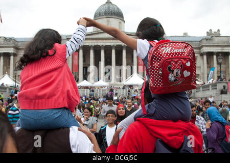 London, UK. 17th Aug, 2013. Thousands of people join festivities in Trafalgar square in celebration of the end of the holy month of Ramadan with stage entertainment, food and children's activities Credit:  amer ghazzal/Alamy Live News Stock Photo