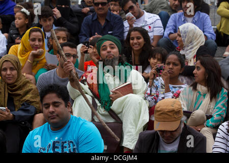 London, UK. 17th Aug, 2013. Thousands of people join festivities in Trafalgar square in celebration of the end of the holy month of Ramadan with stage entertainment, food and children's activities Credit:  amer ghazzal/Alamy Live News Stock Photo