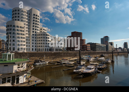 The 'Dancing Buildings' by Frank O Gehry at Medienhafen with the Düsseldorf Marina Stock Photo