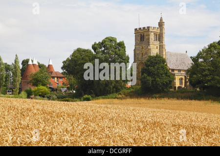 Horsmonden St Margarets Church and Oast House Kent England UK Stock Photo