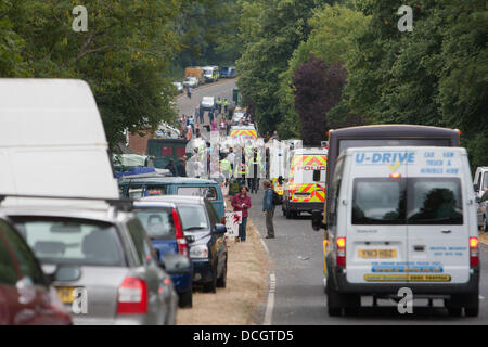 Balcombe, West Sussex, UK. 17th Aug, 2013. Protesters against Cuadrilla drilling & fracking just outside the village of Balcombe are escorted by police towards the protest site on the London Road. Credit:  martyn wheatley/Alamy Live News Stock Photo