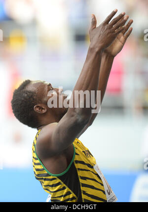 Usain Bolt of Jamaica reacts after the Men's 4x100m Relay Final at the 14th IAAF World Championships in Athletics at Luzhniki Stadium in Moscow, Russia, 18 August 2013. Photo: Bernd Thissen/dpa Stock Photo