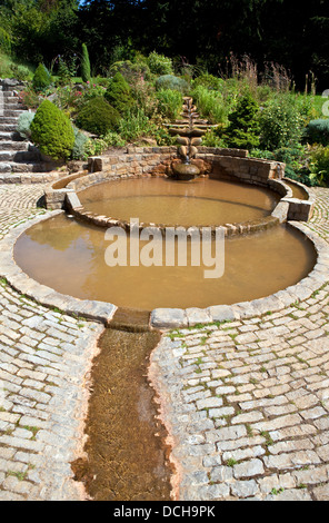 The Vesica Pool in the Chalice Well Gardens in Glastonbury. Stock Photo