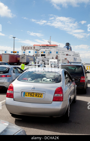 Cars waiting to board the car ferry for the channel crossing, at Calais harbour, Calais to Dover route, France Europe Stock Photo