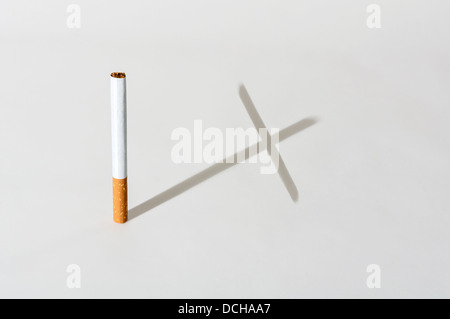 Smoking kills cigarette cross shaped shadow Stock Photo