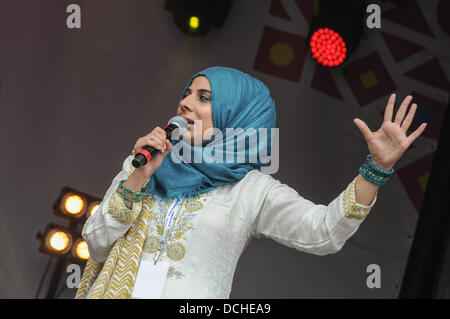 London, UK. 17th Aug, 2013. Presenter at the Eid al-Fitr is the global Muslim celebration which marks the end of the holy fasting month of Ramadan on Trafalgar square in London. Credit:  See Li/Alamy Live News Stock Photo