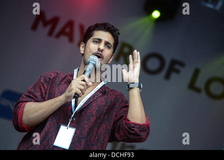 London, UK. 17th Aug, 2013. Presenter at the Eid al-Fitr is the global Muslim celebration which marks the end of the holy fasting month of Ramadan on Trafalgar square in London. Credit:  See Li/Alamy Live News Stock Photo