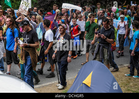 Balcombe, West Sussex, UK. 18th Aug, 2013. Balcombe, West Sussex, UK. 18th Aug, 2013. Not Dead Yet. Environmentalists parade toward the Cuadrilla site entrance in Balcombe. © David Burr/Alamy Live News Stock Photo