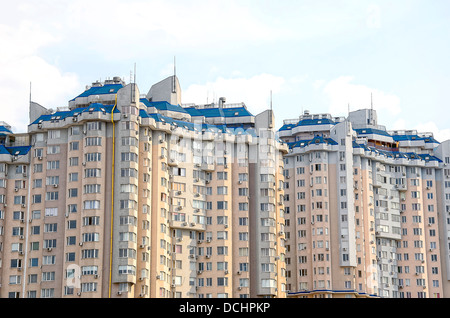 Multi-storey building construction on a background of blue sky Stock Photo