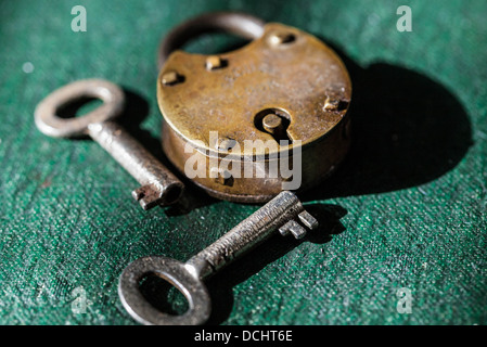 Old padlock and its keys. Stock Photo