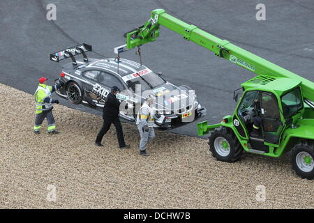 Nuerburg, Germany. 18th Aug, 2013. US BMW driver Joey Hand is recovered at the German Touring Car Masters (DTM) qualification at the Nuerburgring racing curcuit near Nuerburg, Germany, 18 August 2013. Photo: Thomas Frey/dpa/Alamy Live News Stock Photo