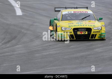 Nuerburg, Germany. 18th Aug, 2013. German Audi driver Mike Rockefeller in action at the German Touring Car Masters (DTM) qualification at the Nuerburgring racing curcuit near Nuerburg, Germany, 18 August 2013. Photo: Thomas Frey/dpa/Alamy Live News Stock Photo