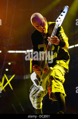 Gelsenkirchen, Germany. 18th Aug, 2013. Bassist Shavarsh 'Shavo' Odadjian of the US band System of a Down performs onstage at the Rock im Pott music festival in Gelsenkirchen, Germany, 18 August 2013. The festival takes place for thr second time. Photo: Caroline Seidel/dpa/Alamy Live News Stock Photo