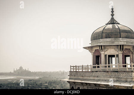 Taj Mahal viewed on the horizon from Musamman Burj at Agra Fort / Red Fort, Agra, India a UNESCO World Heritage site Stock Photo