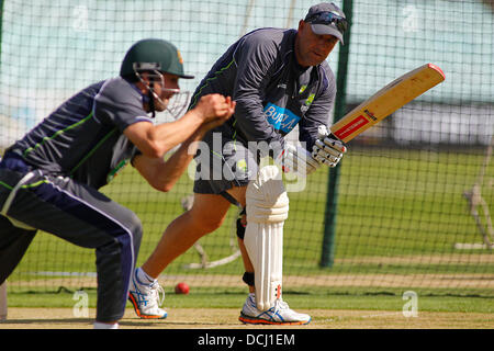 LONDON, ENGLAND - August 19: Head Coach Darren Lehmann carries out fielding drills practice with Ed Cowan during the official training session prior to the 5th Investec Ashes cricket match between England and Australia played at The Kia Oval Cricket Ground on August 19, 2013 in London, England. (Photo by Mitchell Gunn/ESPA) Stock Photo