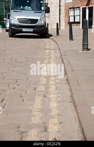 Van vehicle parked on double yellow lines in the town city centre York North Yorkshire England UK United Kingdom GB Great Britain Stock Photo