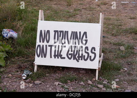 No driving on the grass sign at the Glastonbury festival 2013, Somerset, England, United Kingdom. Stock Photo