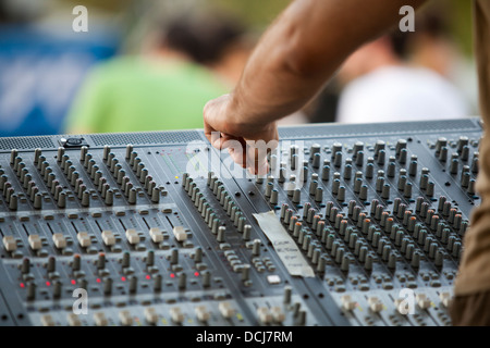 adjusting of audio mixer Stock Photo