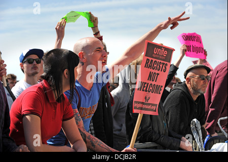 Anti fascist protesters make their feeling clear to members of the English Defence League during an EDL march through Brighton Stock Photo