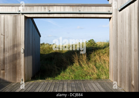 The yard can be open or closed, for shelter or draft according to temperature. The gate opening frames the landscape. Stock Photo