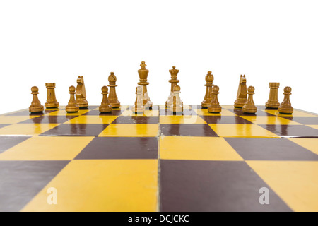 Worn vintage wooden chess set isolated with clipping path. Stock Photo