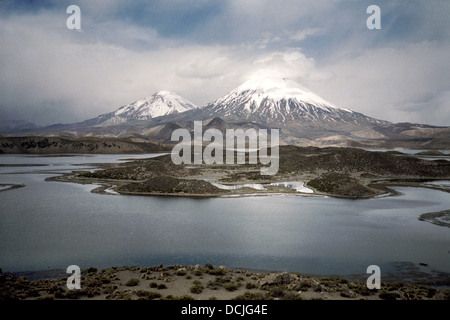 Lake Chungara, Chile, with the volcanoes Payachatas in the background Stock Photo