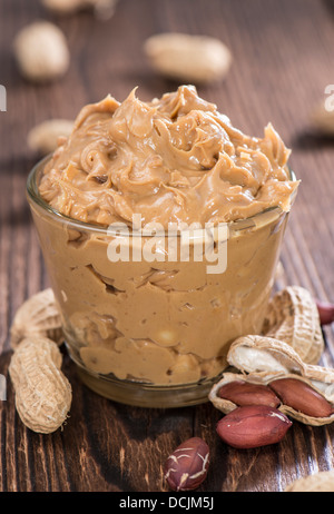Portion of Peanut Butter in a small bowl Stock Photo
