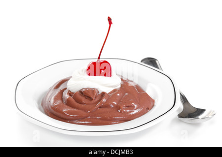 Chocolate pudding dessert with whipped cream and a cherry on the top Stock Photo