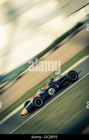 1950s, historical, a racing driver on a track in an open-top, single ...