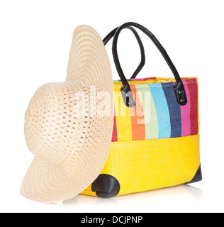 Beach bag and hat. Isolated on white background Stock Photo