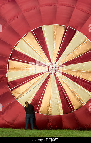 Crew attending a Balloon Crown before a flight at the 35th Bristol International Balloon Fiesta. Bristol, England, UK. Stock Photo