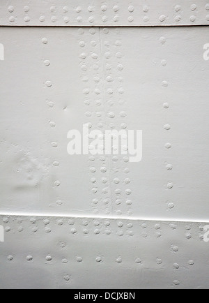 Fragment of the sail ship board with rivets Stock Photo