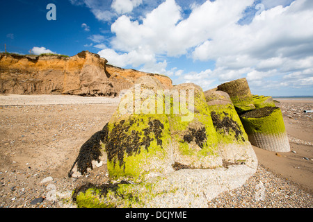 Smashed concrete sea defences at Ulrome near Skipsea on Yorkshires East Coast, UK. Stock Photo