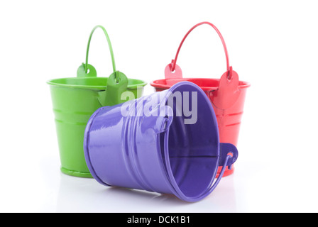 Three Different Colored Buckets With Handles Stock Photo