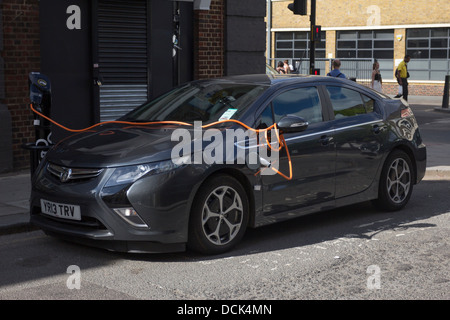 Vauxhall Ampera Electric Car Charging - Camden Town - London Stock Photo