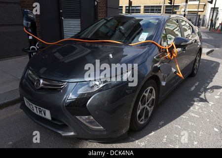 Vauxhall Ampera Electric Car Charging - Camden Town - London Stock Photo