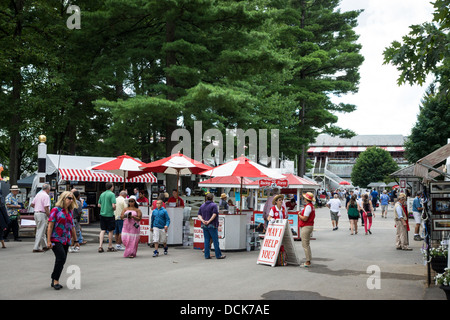 The entrance to the Saratoga Raceway in Saratoga, New York is crowded with people coming to watch and wager on the horse races. Stock Photo