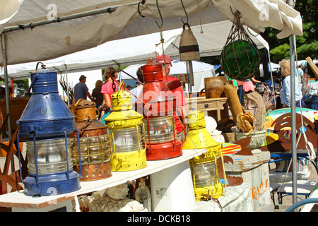 a row of colorful lanterns is lined up for sale at Oronoco Gold Rush Days, an annual antique flea market Stock Photo