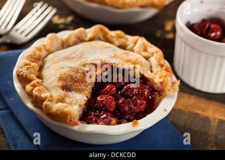 Mini Cherry Pie Dessert on a Background Stock Photo