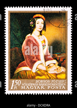 Postage stamp from Hungary depicting the painting 'Lady in Fur-lined Jacket' by Jozsef Borsos. Stock Photo