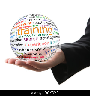 Transparent ball with inscription training in a hand Stock Photo