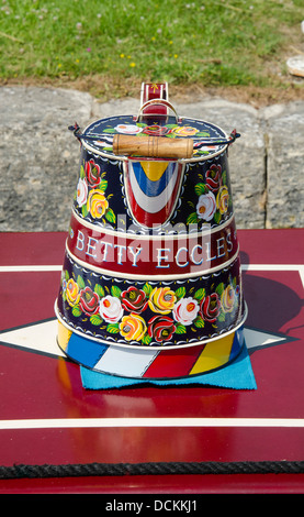 Hand painted water pail on top of the narrowboat Betty Eccles Stock Photo