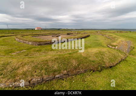 Structure 8 of the Barnhouse Neolithic Village with the Ness of Brodgar in the background, Orkney islands. Stock Photo