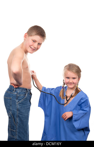 two children are playing doctor with stethoscope Stock Photo