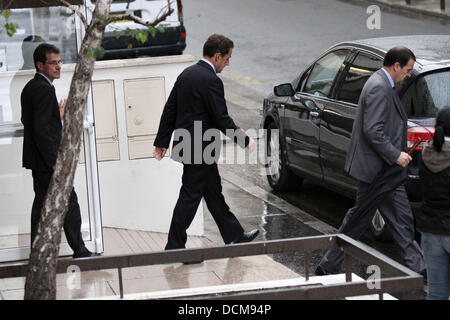 French president Nicolas Sarkozy is seen leaving the Clinique de La Muette hospital where his wife Carla Bruni has recently given birth to a baby girl. The baby was three weeks overdue  Paris, France - 20.10.11 Stock Photo