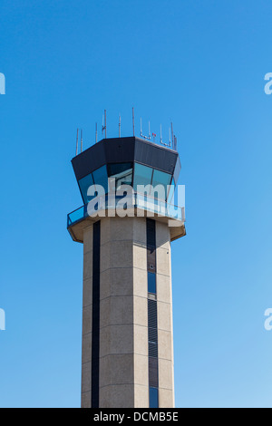 Control tower at a small regional airport against a clear blue sky Stock Photo